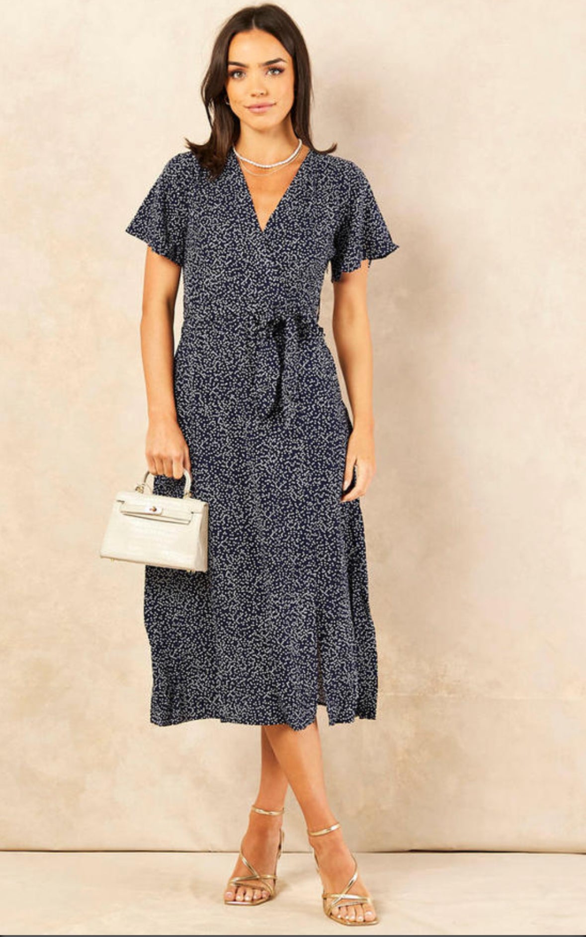 Navy and white polka dot dress